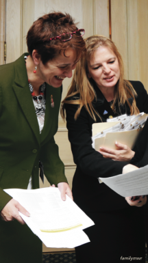 Two women working together